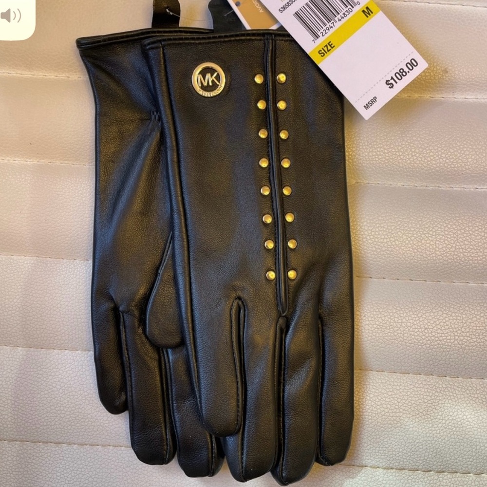 Michael Kors stuffed black gloves size medium.